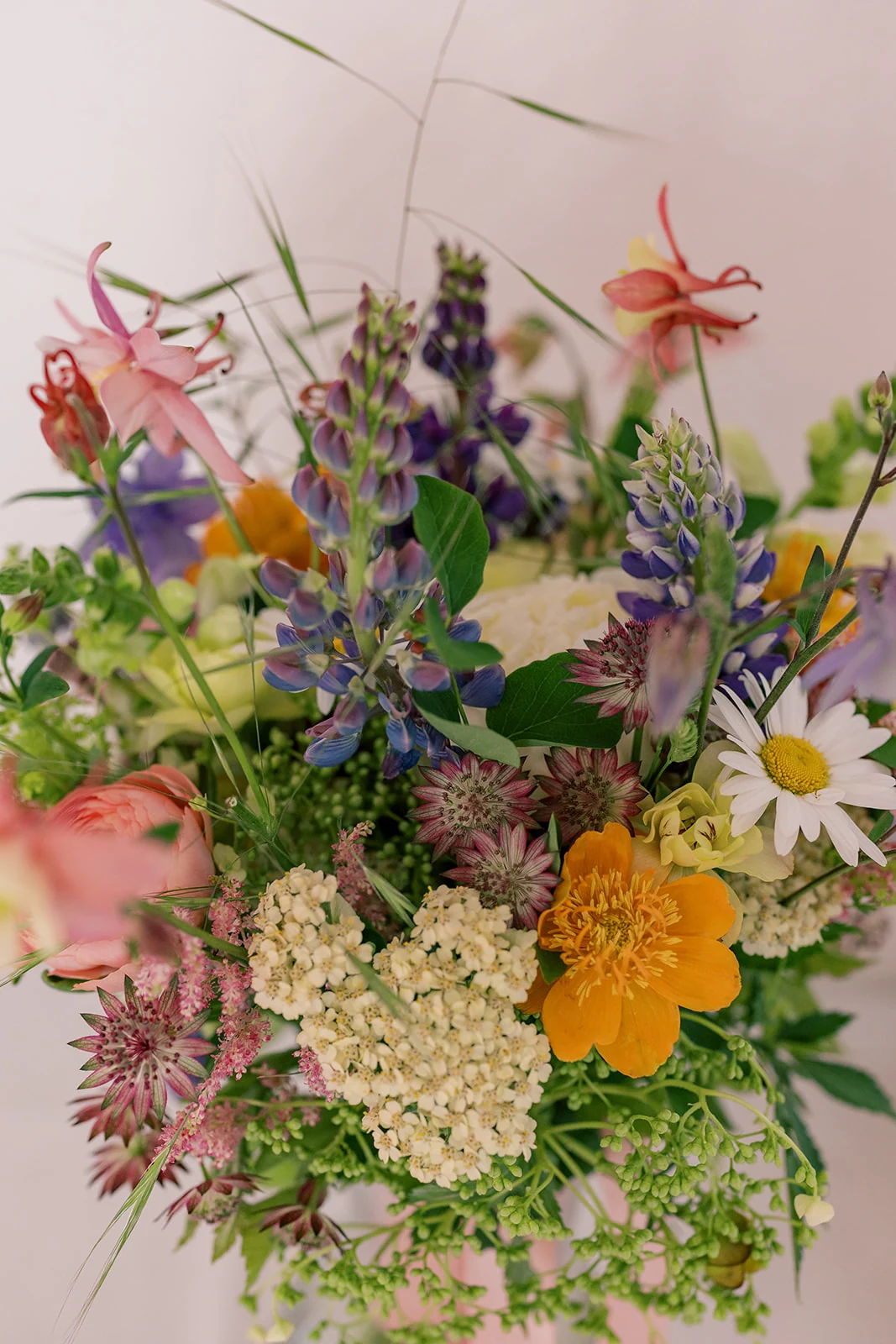A loose arrangement of colorful wedding flowers